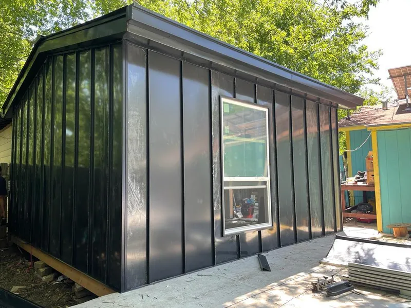 Black standing seam metal wall panels for Metal Roof Installation in Argentine