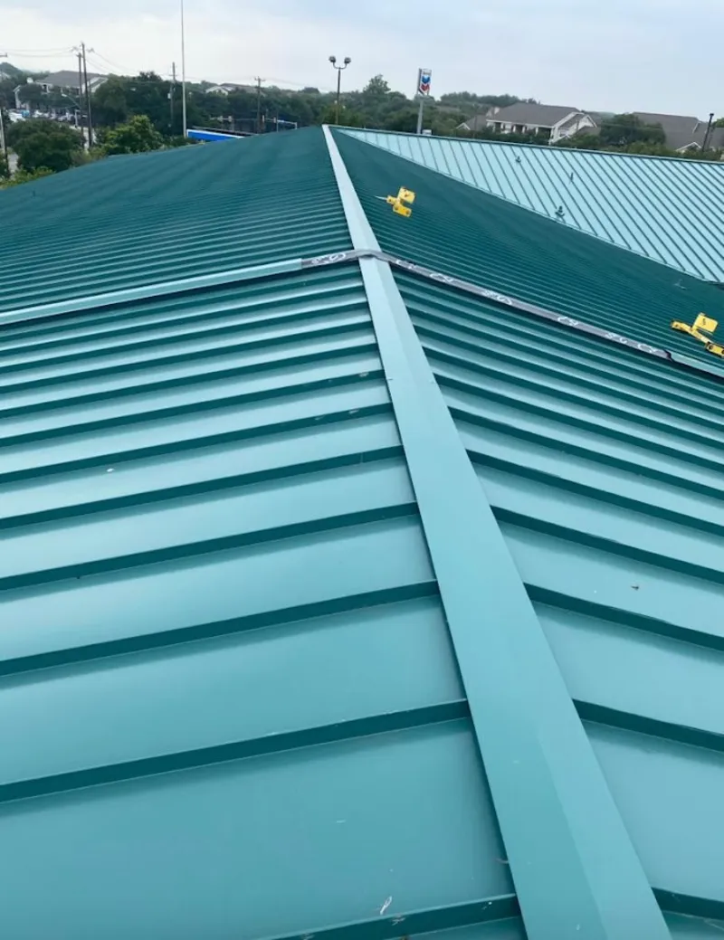 Green commercial metal roof ridge and valley for Metal Roof Repair in Argentine